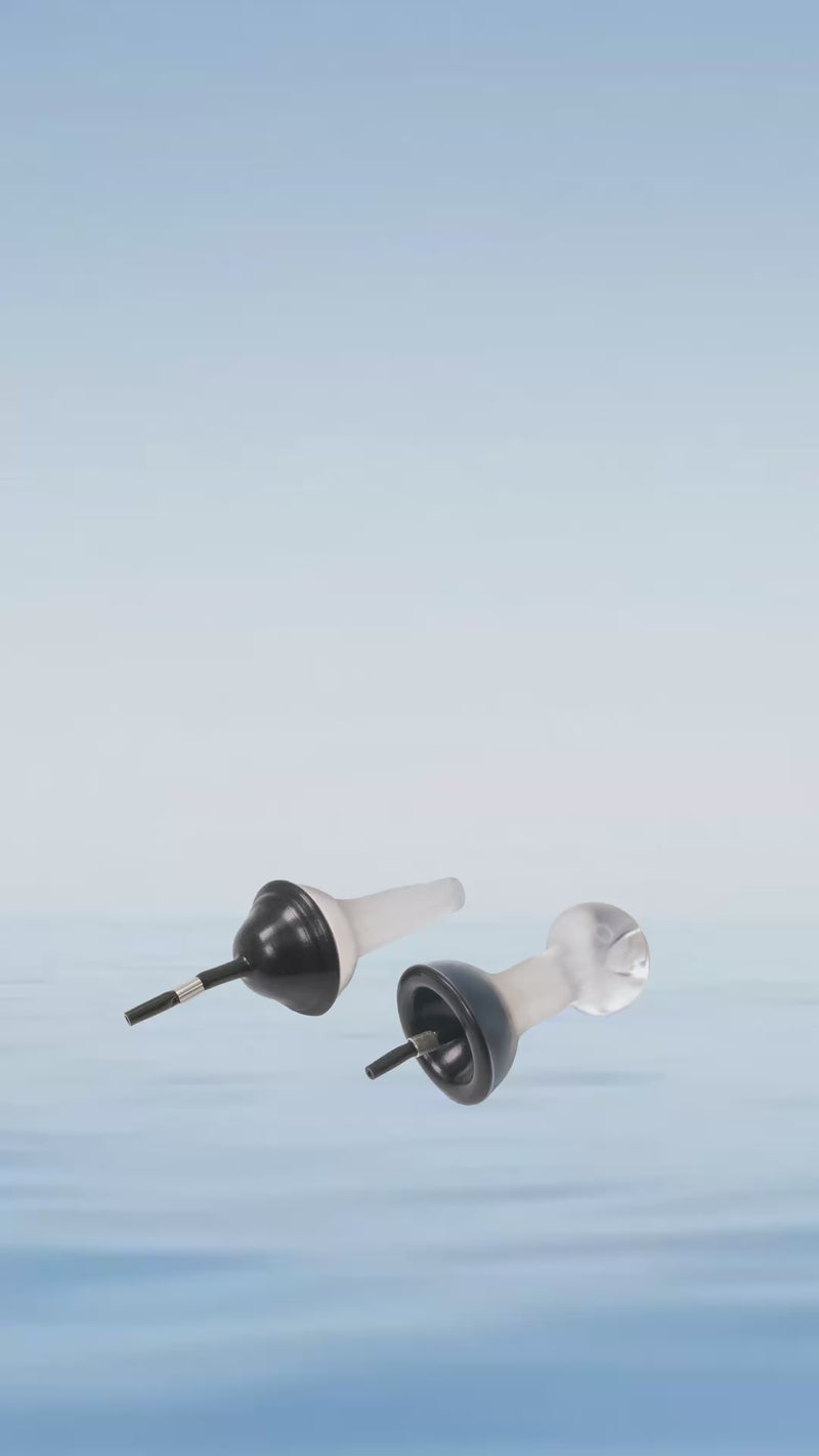 Fluid earplugs over a lake